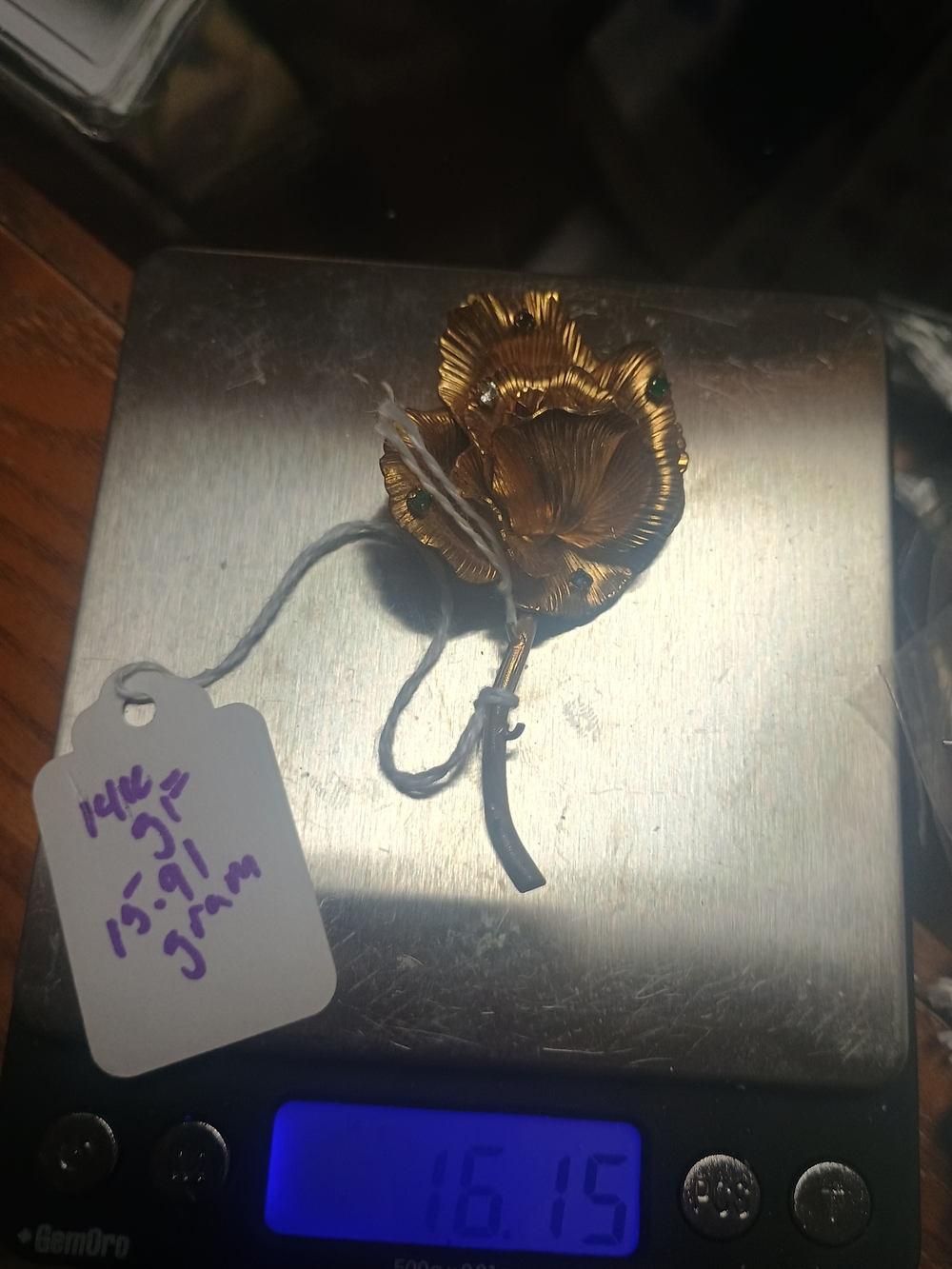 Gold-Tone Floral Brooch with Green Accent